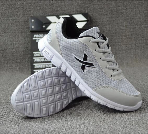 Men's Canvas Shoes / Breathable Air Mesh Running Shoes Clipart